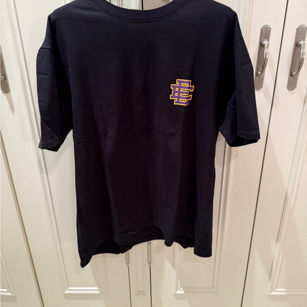 Eric Emanuel Black Tee Purple Yellow logo